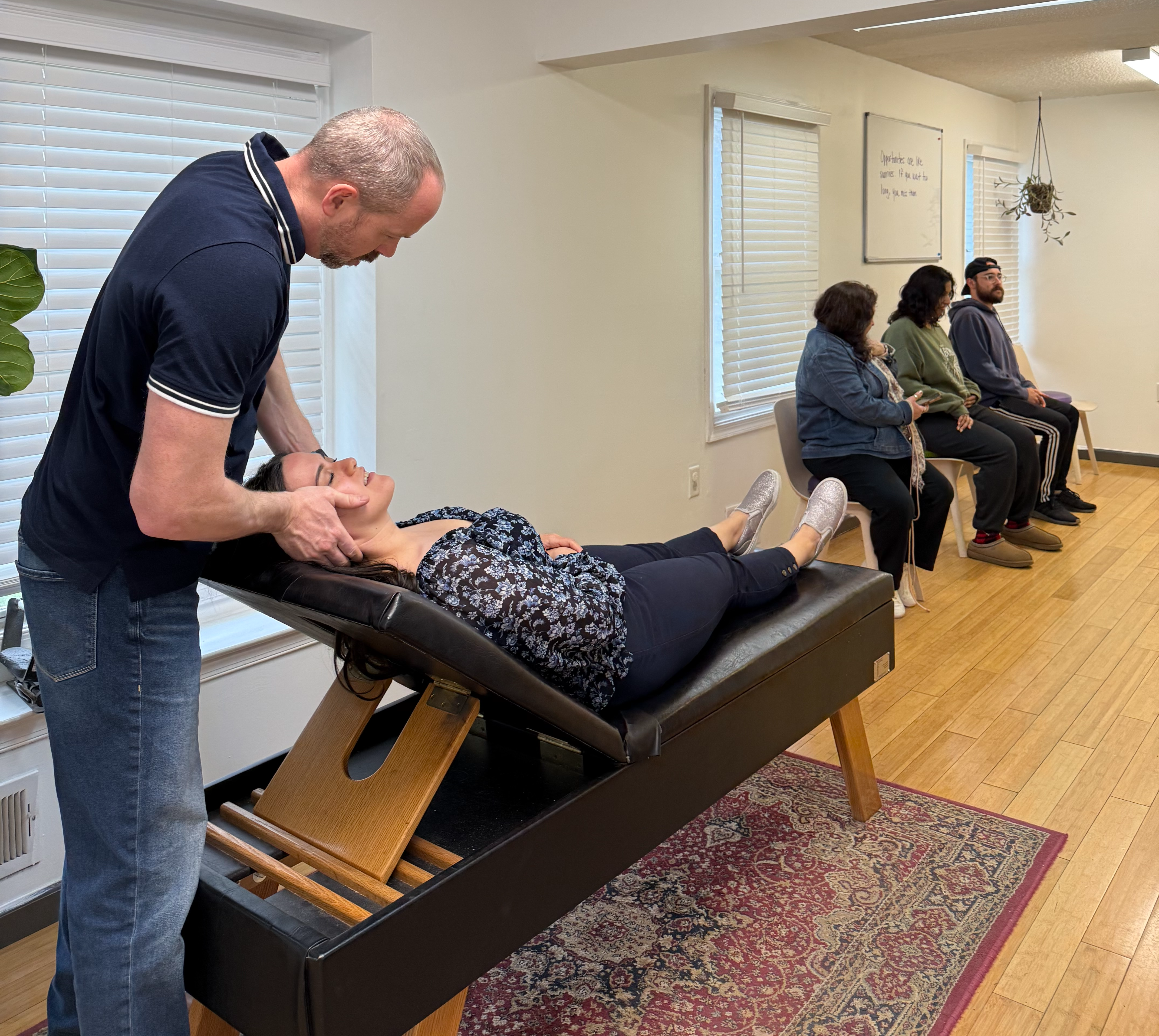 Chiropractor adjusting a patient